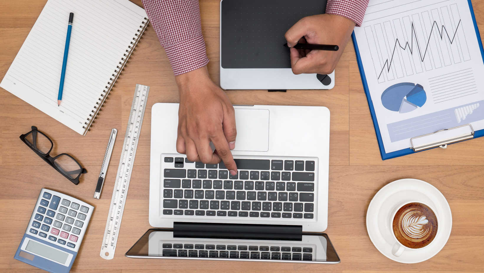 Project Manager using a laptop